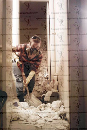 Professional organizer helping remove hoarded items Professional organizer helping remove hoarded items